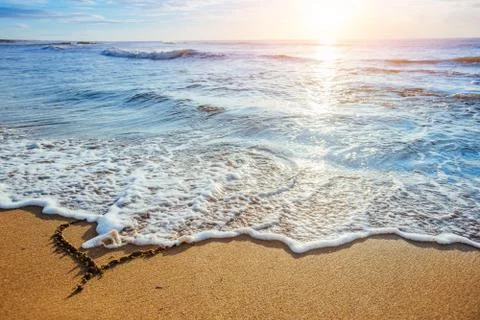 Sunset on the sandy beach Foto stock