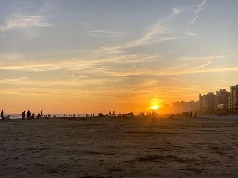 Sunset on a sandy beach 스톡 사진