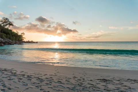 Sunset at a sandy beach in Seychelles Stock Photos