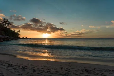 Sunset at a sandy beach in Seychelles Stock Photos