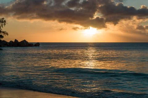 Sunset at a sandy beach in Seychelles Stock Photos