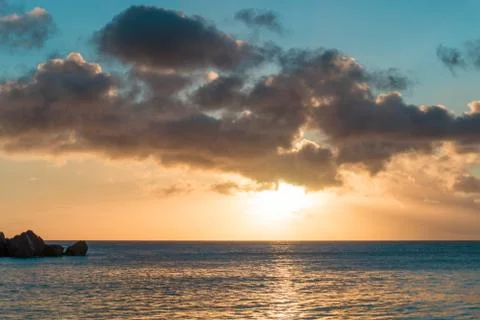 Sunset at a sandy beach in Seychelles Stock Photos