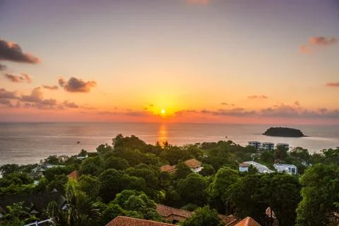 Sunset scene and clouds over Kata Beach in Phuket, Thailand Stock Photos