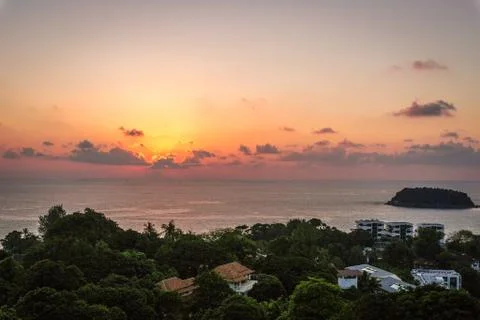 Sunset scene and clouds over Kata Beach in Phuket, Thailand Stock Photos