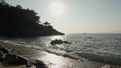 Sunset scene and silhouette at beach in Lamma Island, Hong Kong - 4k Stock-Footage 296327475
