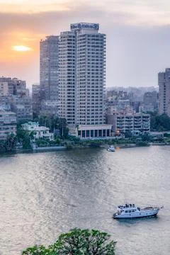 Sunset scene from cairo in Egypt shows the nile and sailboat Stock Photos