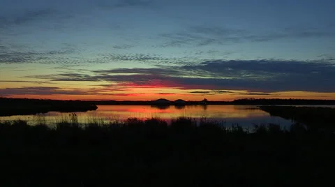 Sunset Scene over a Marsh Stock Footage 47986804
