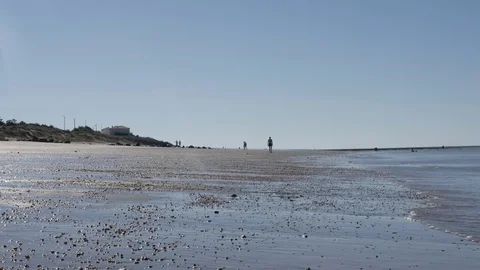 Before sunset scene with sand and waves on the sea beach Stock Footage 72192126