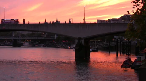 Sunset scene Waterloo bridge on River Thames in London Stock Footage 32700443