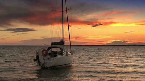 Sunset scenery with sailing boat Stock Footage 32596045