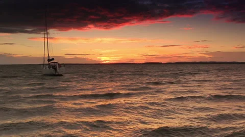 Sunset scenery with sailing boat Stock Footage 32596054