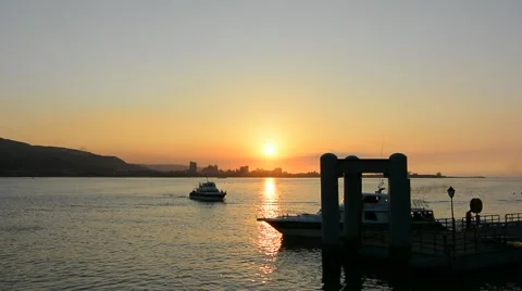 Sunset scenery with silhouette of ships Stock Footage 44349750