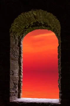 Sunset sea ancient window Stock Photos