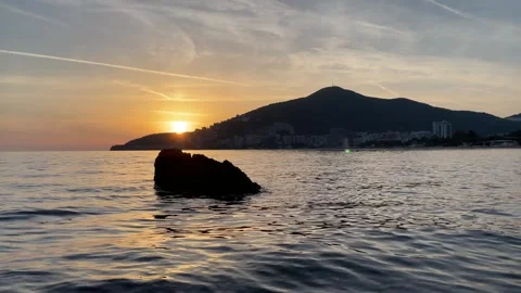 Sunset, sea and mountain Stock Footage 289632186