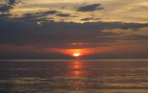 Sunset with sea background Stock Photos