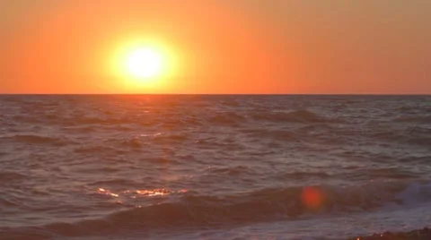 Sunset at the sea beach, beautiful reflections in the water Stock-Footage 8365905