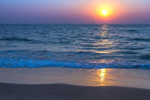 Sunset at sea beach Stock Photos