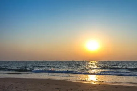 Sunset at sea beach Stock Photos