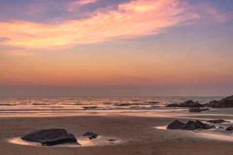 Sunset at sea beach Stock Photos