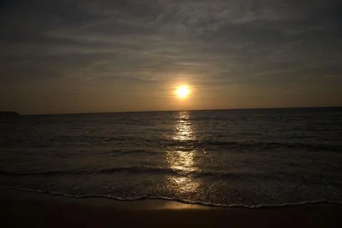 Sunset sea beach Stock Photos