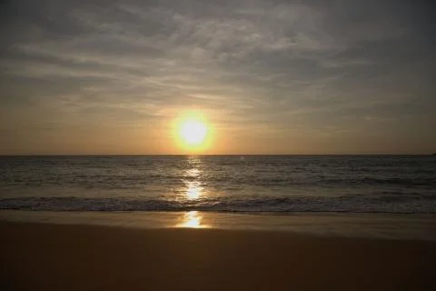 Sunset sea beach Stock Photos
