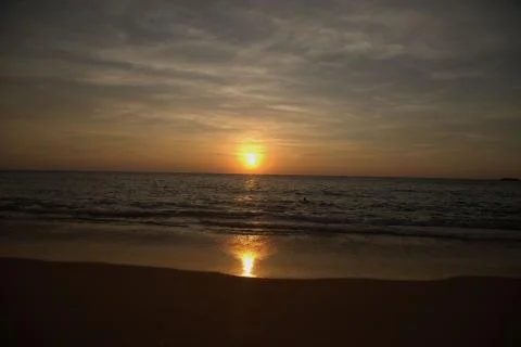Sunset sea beach Stock Photos