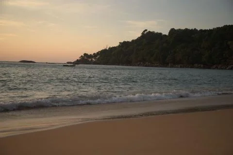 Sunset sea beach Stock Photos