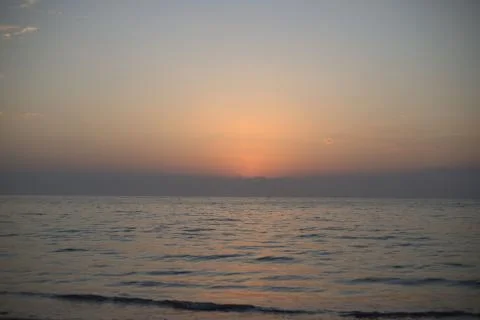 Sunset sea beach Stock Photos