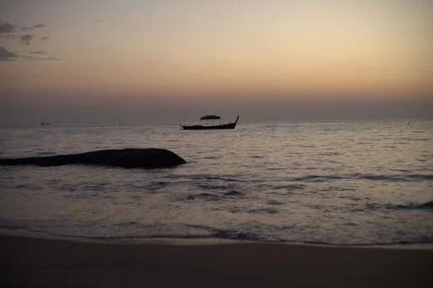 Sunset sea beach Stock Photos