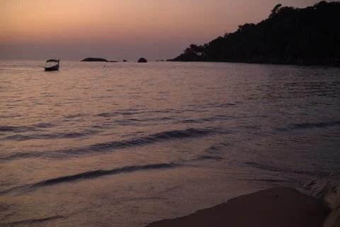 Sunset sea beach Stock Photos
