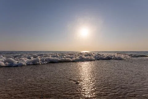 A sunset on the sea beach 스톡 사진