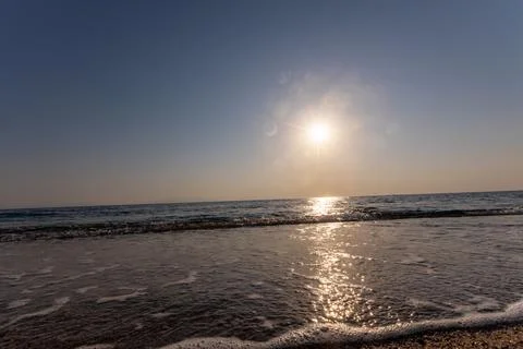 A sunset on the sea beach 스톡 사진