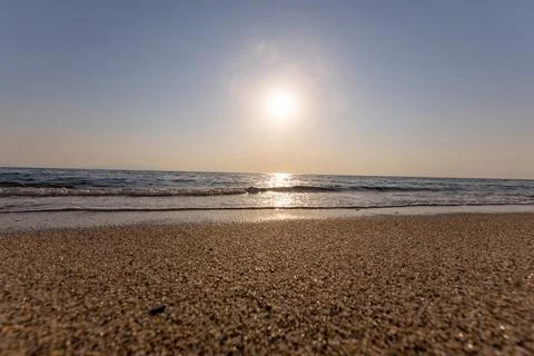A sunset on the sea beach Stock Photos