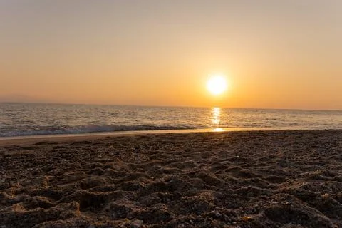 A sunset on the sea beach Stock Photos
