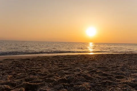 A sunset on the sea beach 스톡 사진
