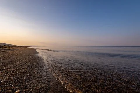 A sunset on the sea beach Stock Photos