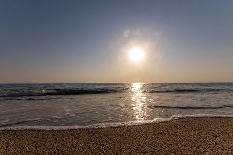 A sunset on the sea beach 스톡 사진
