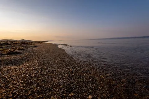 A sunset on the sea beach Fotos de archivo