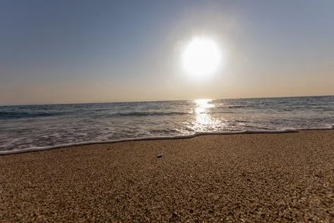A sunset on the sea beach Stock Photos