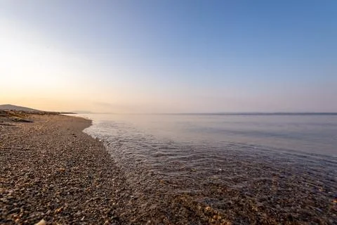 A sunset on the sea beach Stock Photos