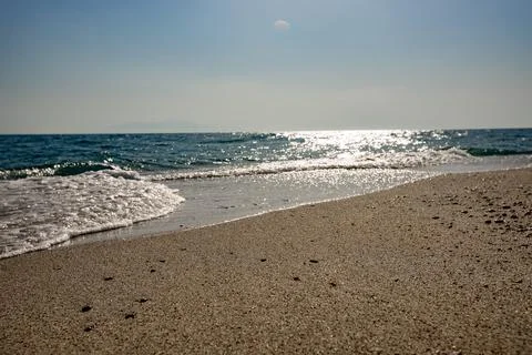 A sunset on the sea beach Stock Photos