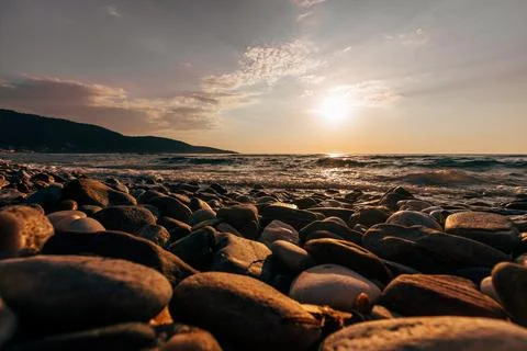 A sunset on the sea beach Stock Photos