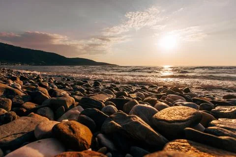 A sunset on the sea beach Stock Photos