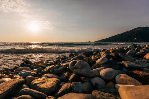 A sunset on the sea beach Stock Photos