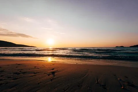 A sunset on the sea beach 스톡 사진