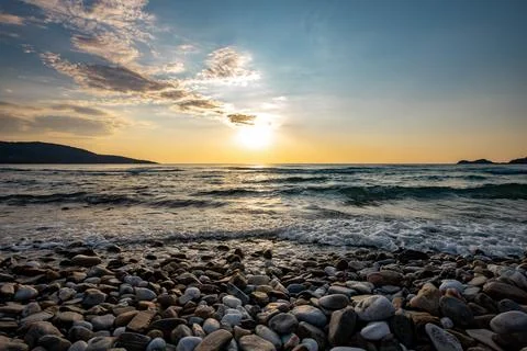 A sunset on the sea beach 스톡 사진