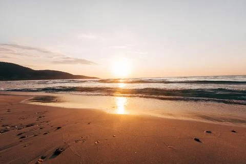 A sunset on the sea beach 스톡 사진