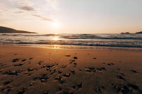 A sunset on the sea beach Stock Photos