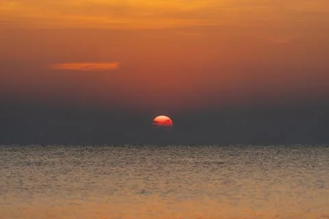Sunset with sea beach Stock Photos