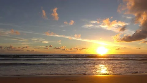 Sunset sea beach sand sun cloud variance sunny water wave blue sky background Stock Footage 153378178